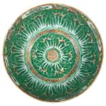 A green ground Chinese bowl with stylised floral decoration, diameter 33cm