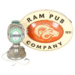 A Vintage Heineken beer tap and metal sign, and a ceramic plaque advertising The Ram Pub Company,