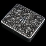 A Chinese export silver box, rectangular form with relief embossed chrysanthemum and character