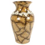 A large brown glazed stoneware vase, with applied white flower garland, H41cm