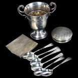 A silver 2-handled cup, a set of 6 bright-cut teaspoons, a silver lid, and a silver desk-top clock