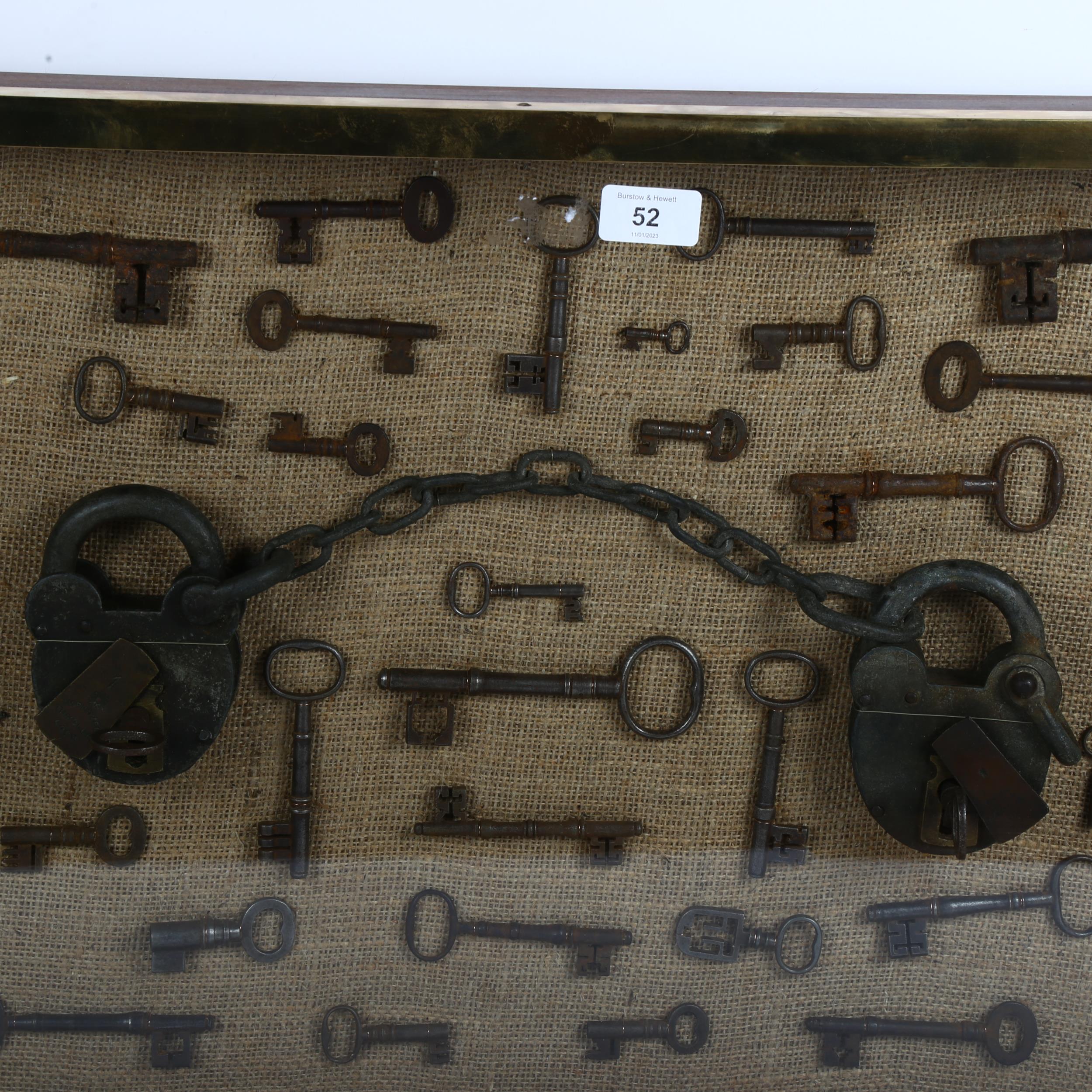 A large wall-hanging display case containing Vintage and Antique skeleton keys, including a set of - Image 2 of 2