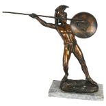 A patinated brass sculpture of a spear-throwing Achilles, on a marble base, H32cm