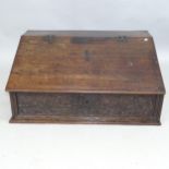 A 17th century carved oak Bible box. 78x38x53cm.