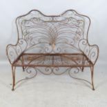 An antique wrought iron wirework garden bench. 125x109x64cm