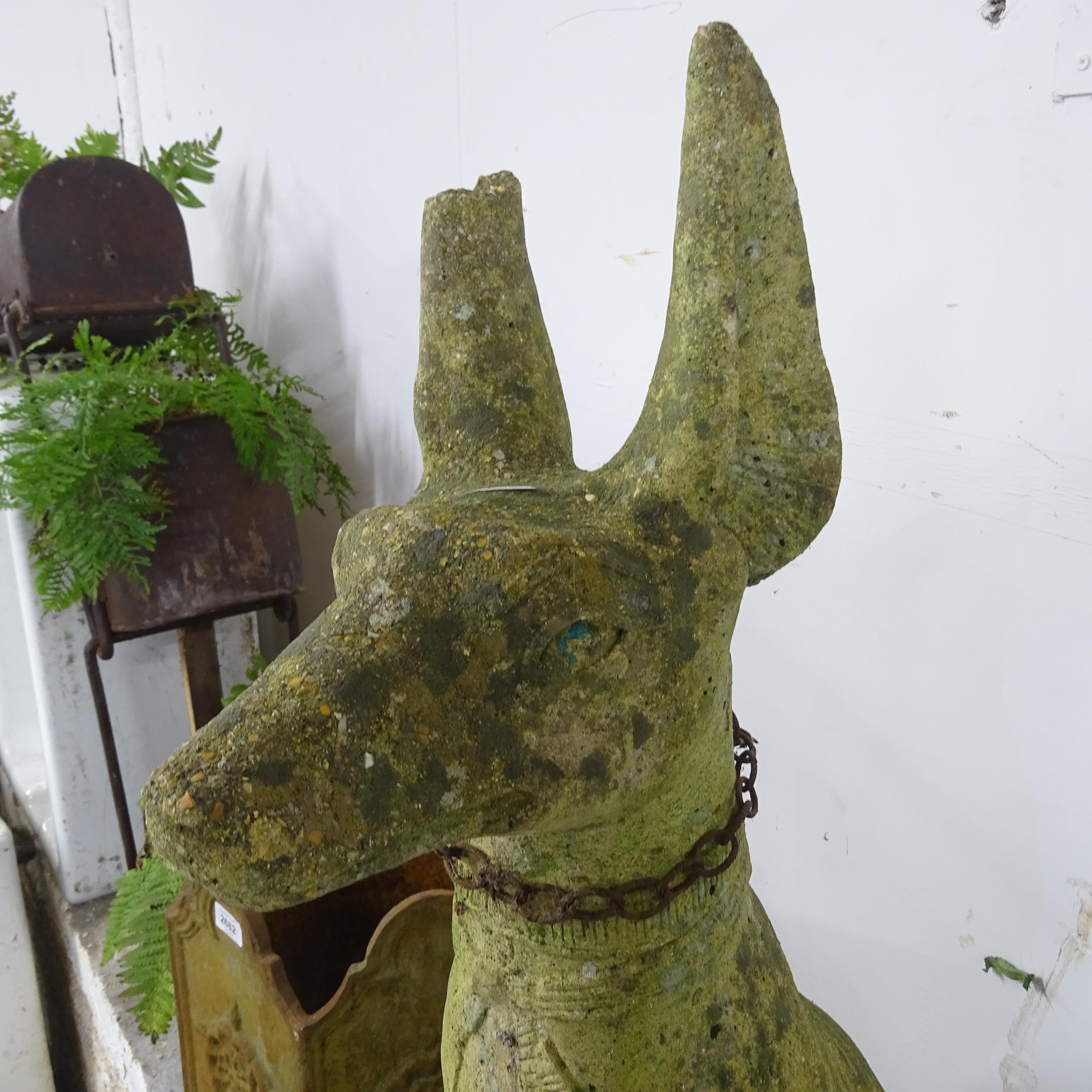 A weathered concrete garden statue, study of an Egyptian hound. Height 88cm. - Image 2 of 2