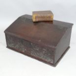 A 17th century carved oak Bible box, monogrammed RC. 62x29x41cm, and an antique Bible.