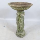 A weathered concrete two-section bird bath on stand in the form of the Three Graces. 43x75cm.