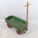 A vintage painted wooden cart. Dimensions excluding handle 83x37x40cm