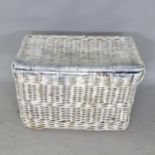 A painted wicker laundry basket. 95x58x57cm