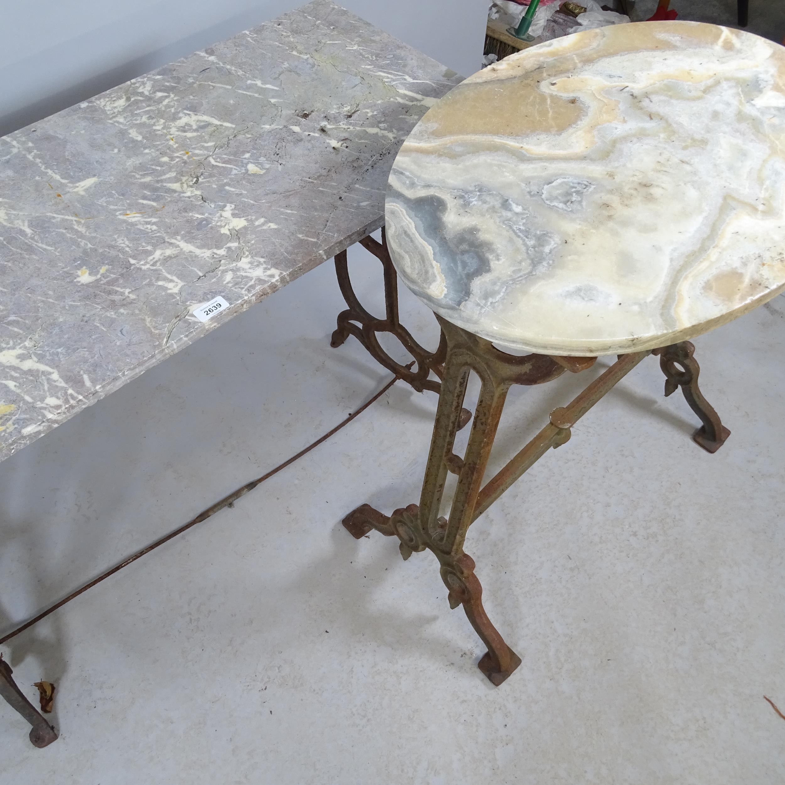 A rectangular marble top garden table on cast iron stand, 108x74x50cm, and an oval marble top garden - Image 2 of 2