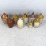 Nine various stoneware flagons. Tallest 47cm overall.