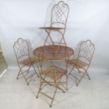 A vintage wrought metal folding garden table, 80x75cm, and four matching folding chairs.
