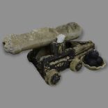 A weathered concrete garden cannon ornament, with balls, 125 x 50 x 50cm