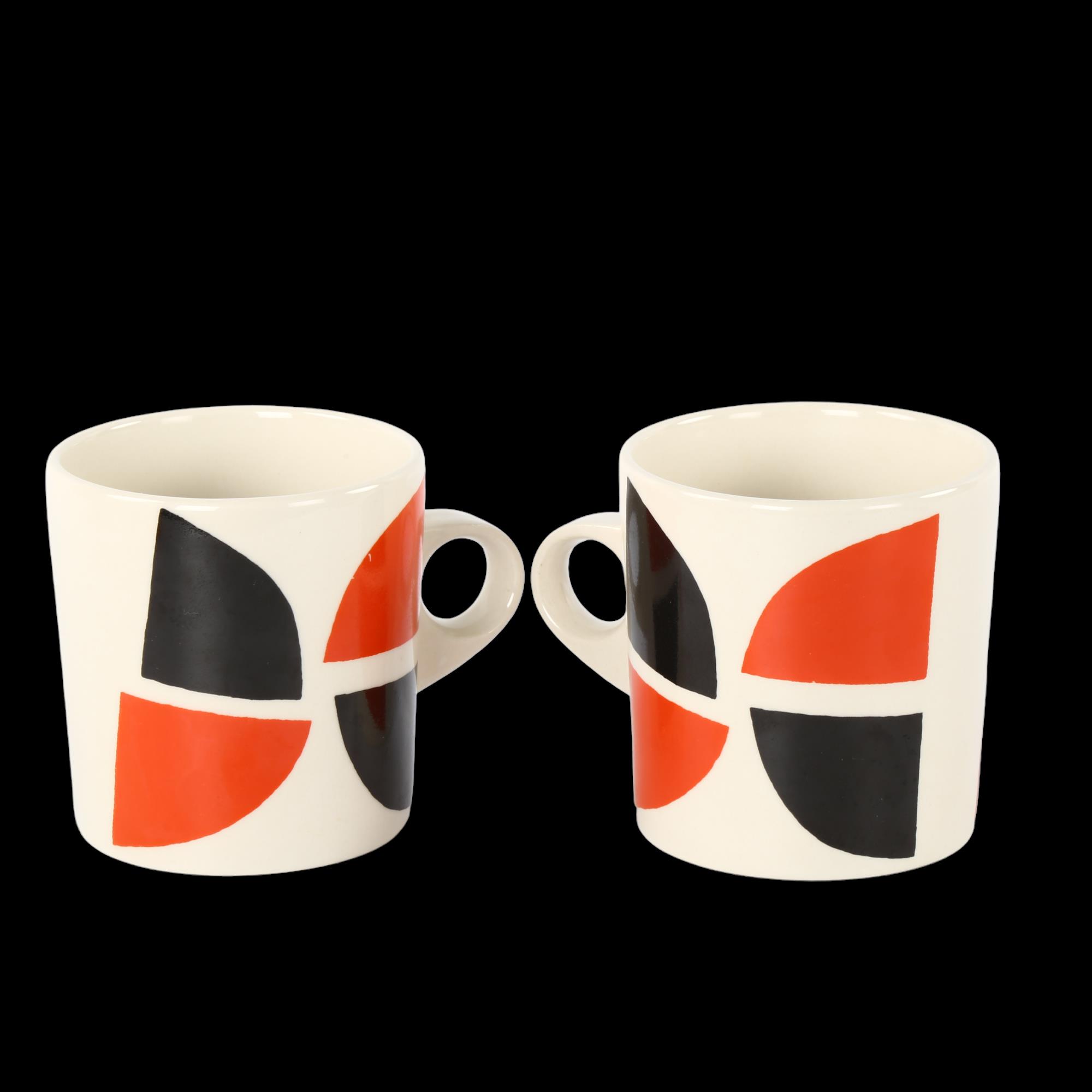 A pair of Terry Frost design mugs , signed to base, height 8.5cm