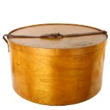 A large early 20th century Luterma bent ply hat box, with leather strap, stamped outside of base and