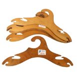 A set of modernist plywood coat hangers