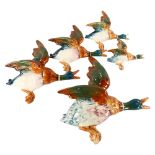 A set of 5 Beswick wall-hanging Ducks, with makers marks, model nr 596-1-2-3-4, largest unmarked,