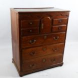 18th century oak chest of drawers of small size, with central alcove arch-top cupboard, width