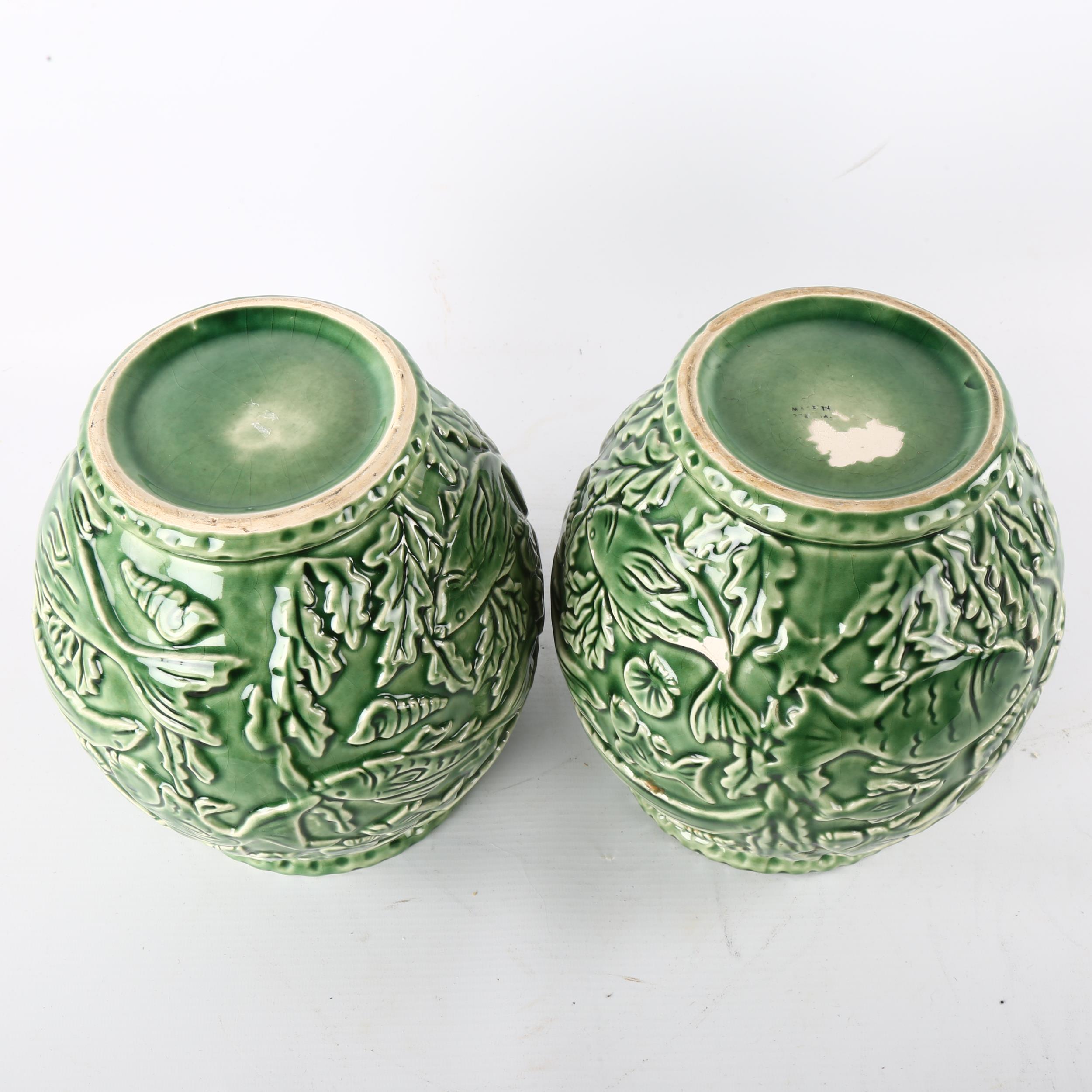 A pair of French green glaze pottery vases, with relief moulded under-sea decoration, height 21cm - Image 3 of 3