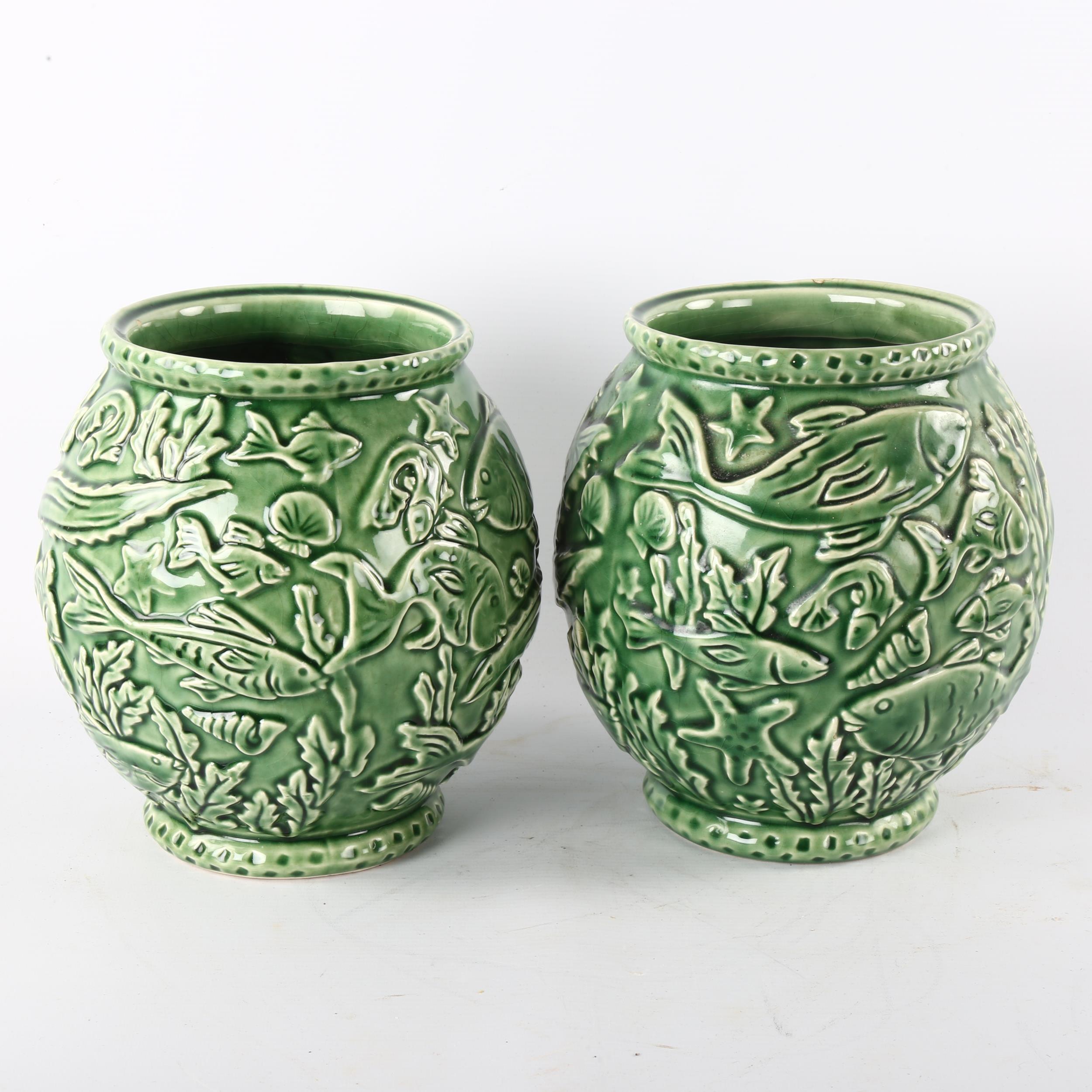 A pair of French green glaze pottery vases, with relief moulded under-sea decoration, height 21cm - Image 2 of 3