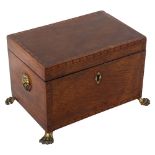 A Regency exotic wood tea caddy, possibly partridge wood, with inlaid parquetry bands, inner lids