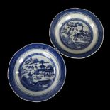 A pair of Chinese blue and white porcelain plates, with painted decoration, diameter 22.5cm