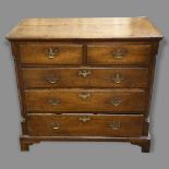 An 18th century oak chest of 3 long and 2 short drawers, with corner columns, width 100cm, depth