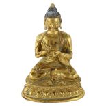 A Chinese gilt-bronze seated Buddha, height 15cm