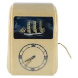 Vitascope cream Bakelite-cased automaton clock, circa 1940s, electric-powered movement with chrome
