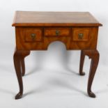 An 18th century crossbanded lowboy with 3 frieze drawers, 73cm x 49cm, height 71cm
