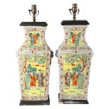 A pair of Chinese porcelain square-section table lamps, with painted enamel panels and lion ring