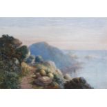 Charles Woolnoth (1815 - 1906), figure on a coastal path, watercolour, signed, 23cm x 33cm, framed