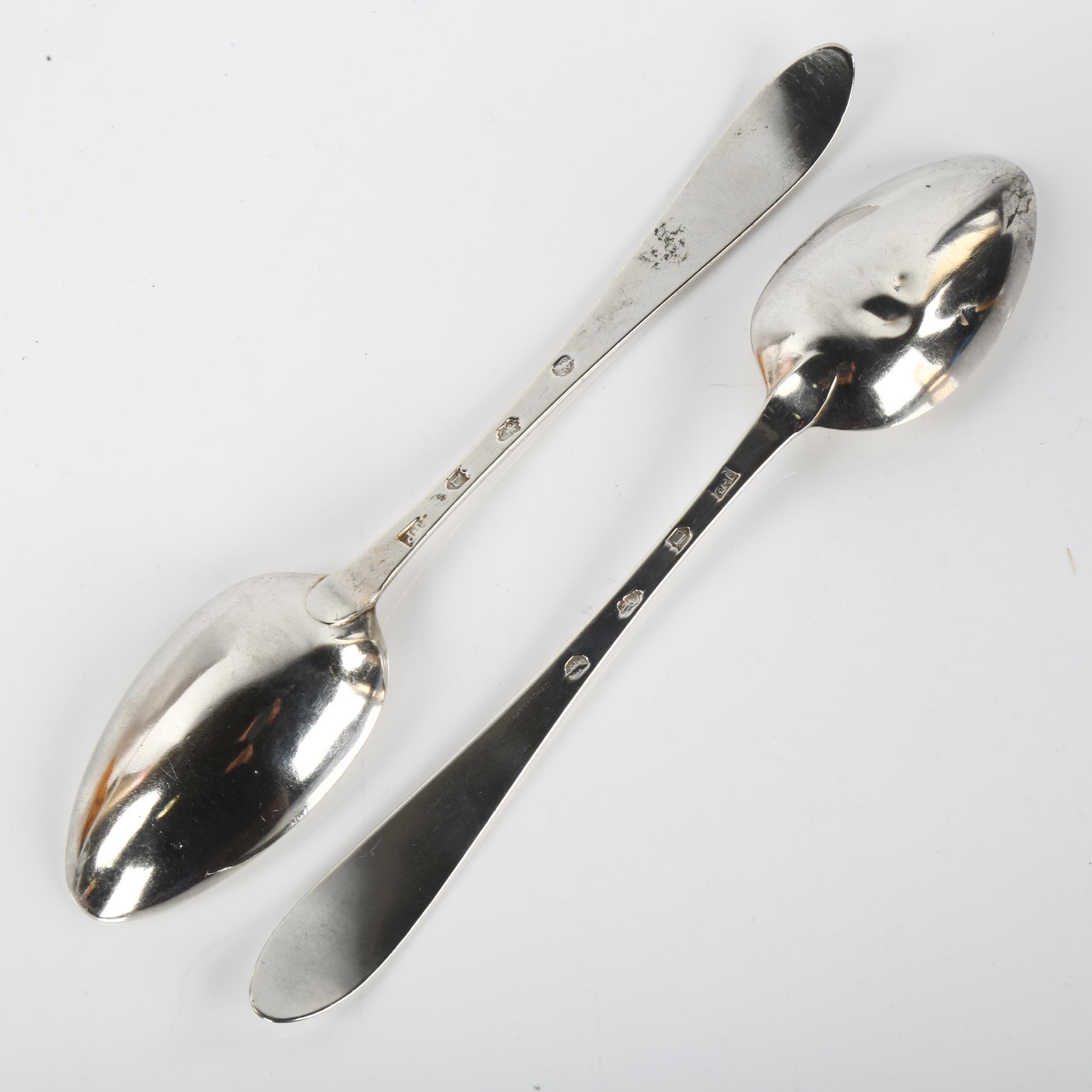 A pair of George III Irish silver serving spoons, with bright-cut engraved decoration, by John - Image 3 of 3