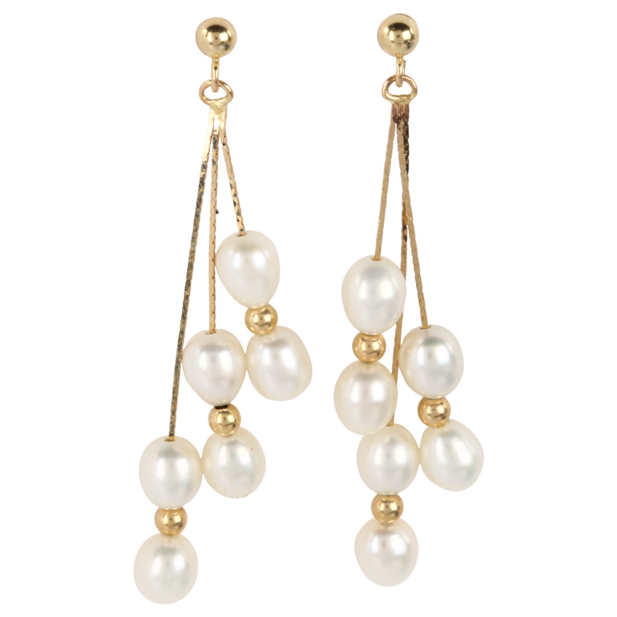 A pair of 14ct gold freshwater pearl drop earrings, with stud fittings, earring height 42.8mm, 2.