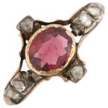 A Georgian garnet and diamond ring, unmarked gold settings with oval mixed-cut garnet and rose-cut