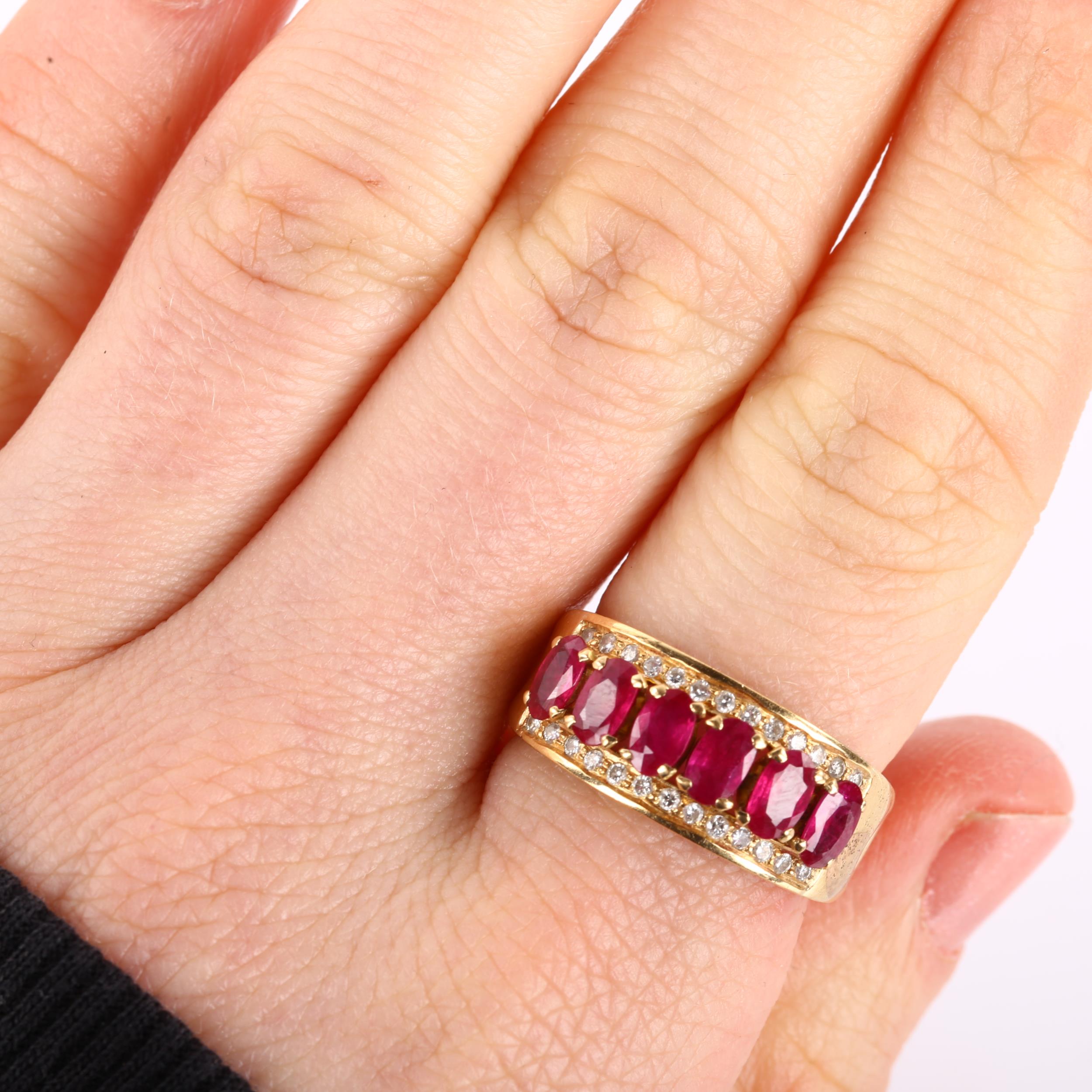 A Continental 18ct gold ruby and diamond band ring, set with oval mixed-cut ruby and modern round - Image 4 of 4