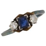 An Art Deco 18ct gold three stone sapphire and diamond crossover ring, set with square step-cut
