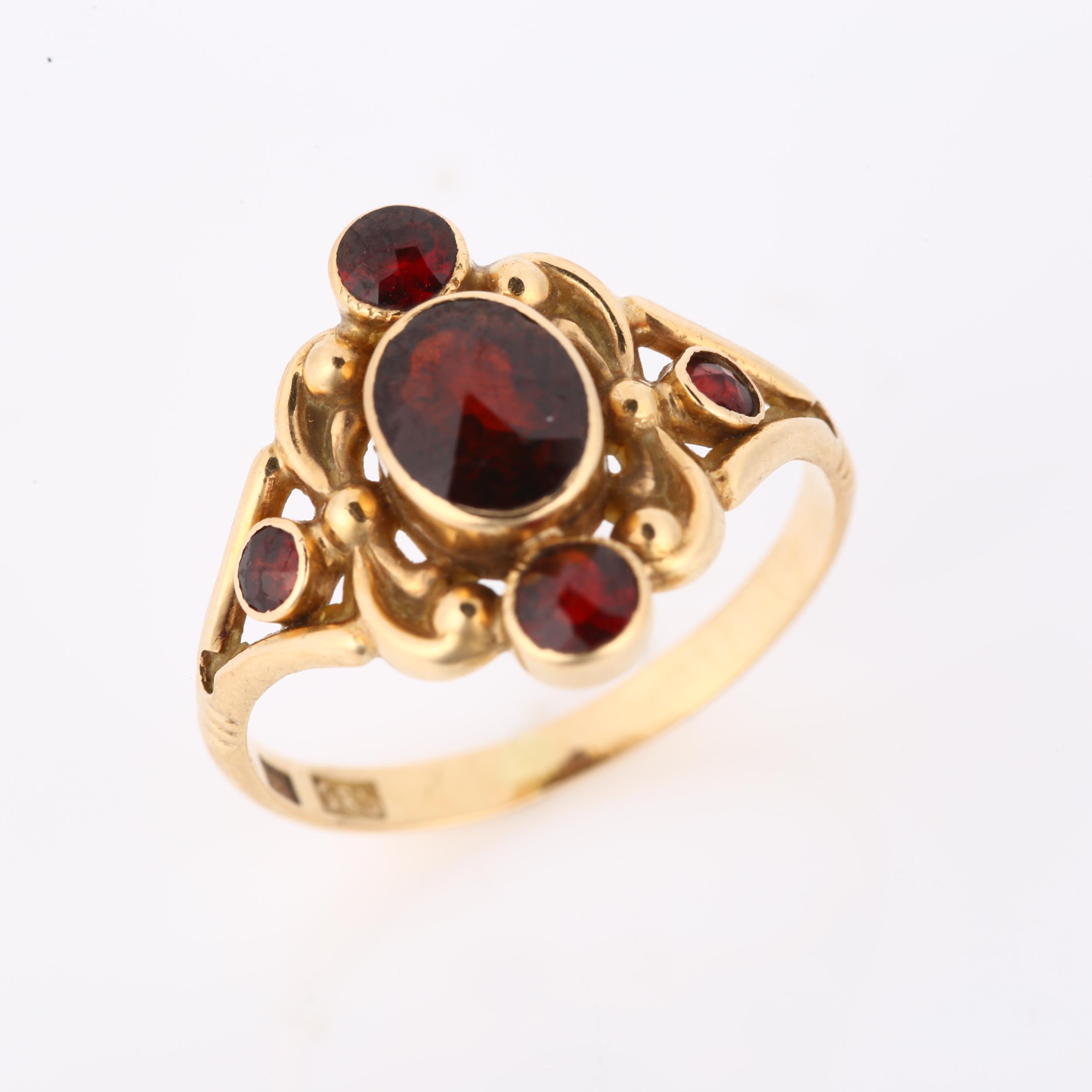 A 14ct gold garnet dress ring, set with rose-cut garnets and foliate decoration, maker's marks CN, - Image 2 of 4