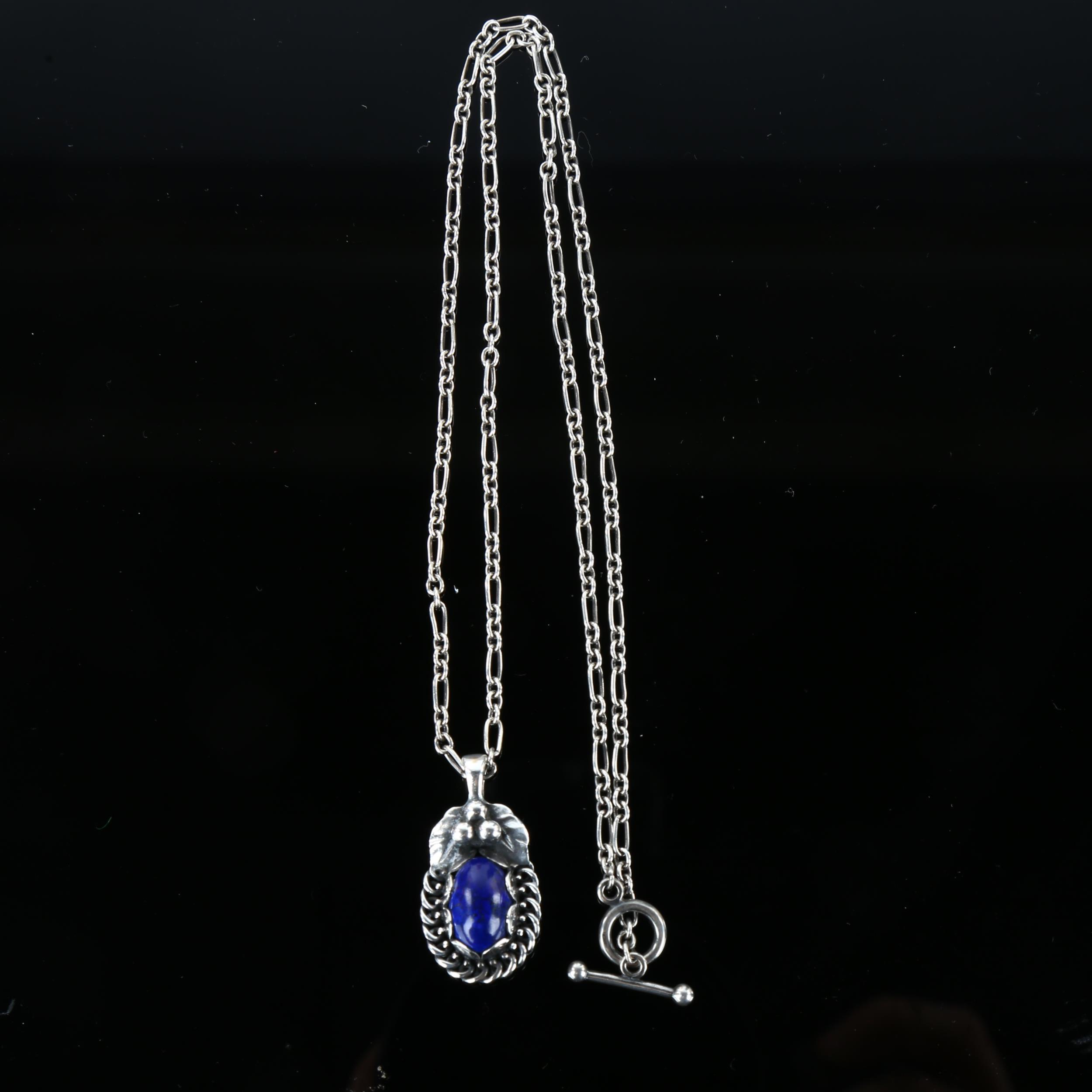 GEORG JENSEN - a Danish stylised sterling silver and lapis lazuli pendant necklace of the year 1992, - Image 3 of 4