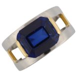 A heavy handmade platinum and 18ct gold synthetic sapphire band ring, set with emerald step-cut