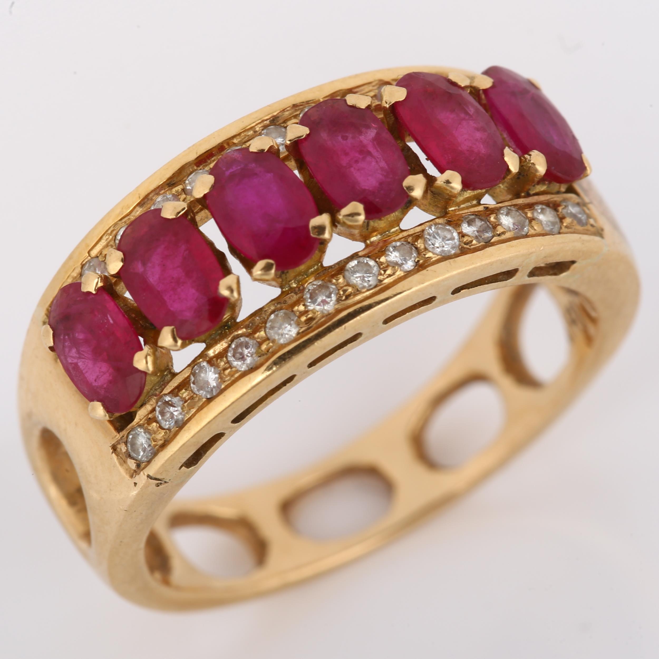 A Continental 18ct gold ruby and diamond band ring, set with oval mixed-cut ruby and modern round - Image 2 of 4