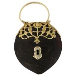 A 17th century gold-mounted tortoiseshell heart padlock charm, openwork floral design, overall