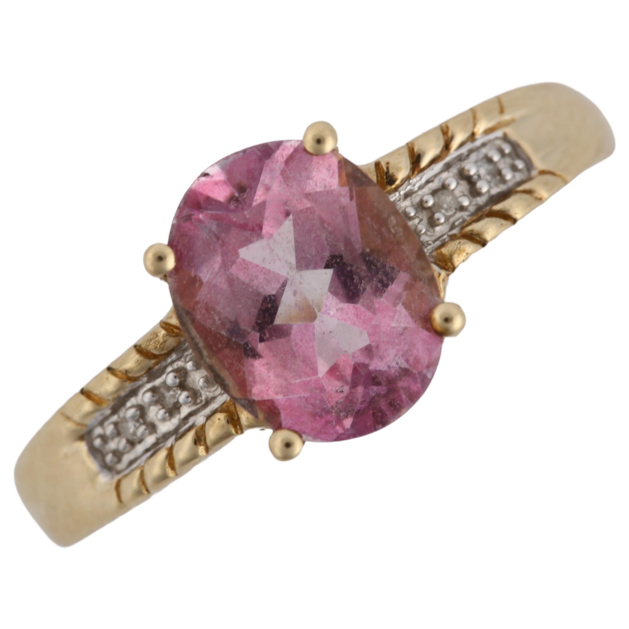 A 9ct gold pink tourmaline and diamond dress ring, set with oval mixed-cut tourmaline, setting