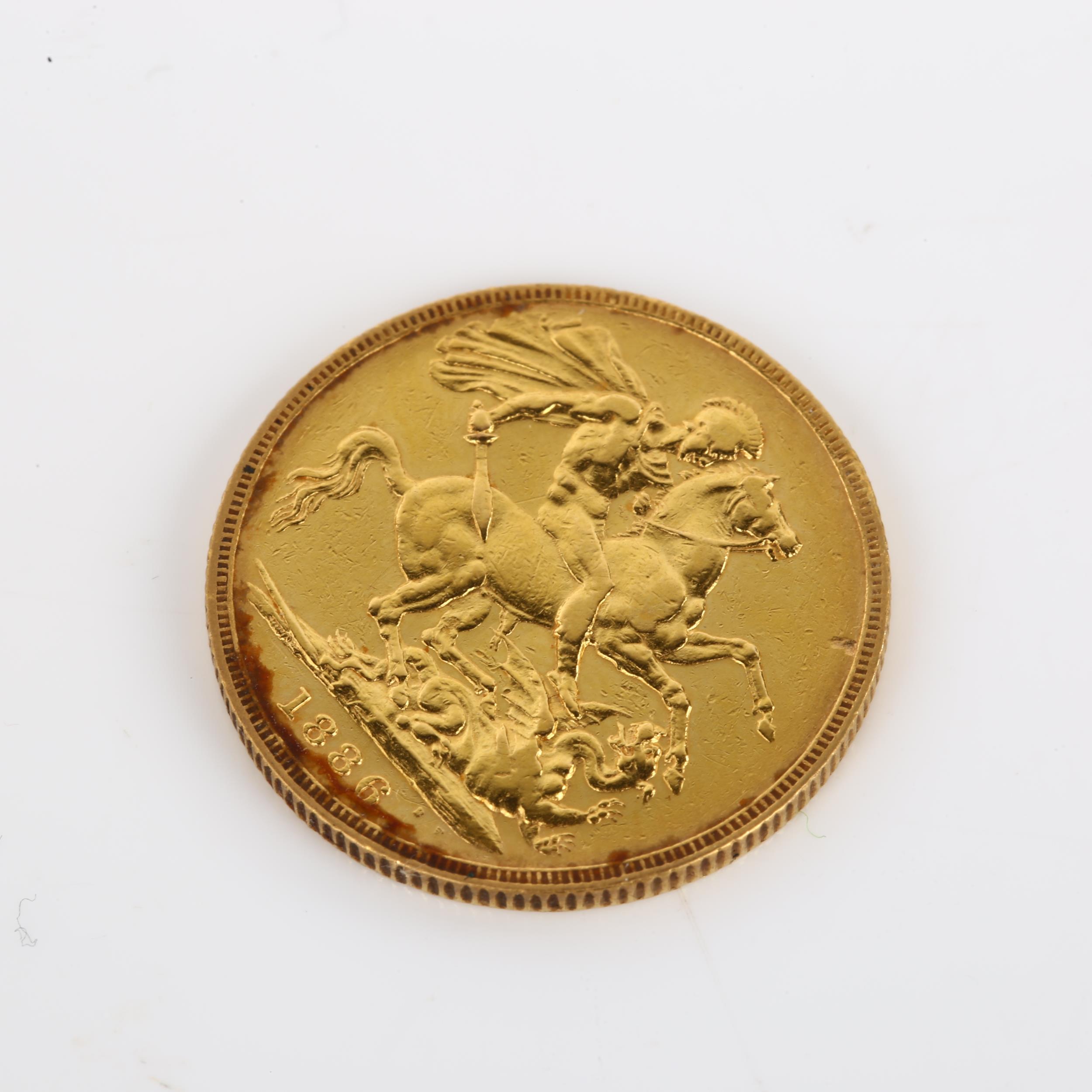 A Victoria 1886 gold full sovereign coin, Melbourne Mint, 7.9g Light surface wear to high points - Image 3 of 4