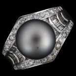 A modern 18ct white gold Tahitian black pearl and diamond dress ring, set with modern round