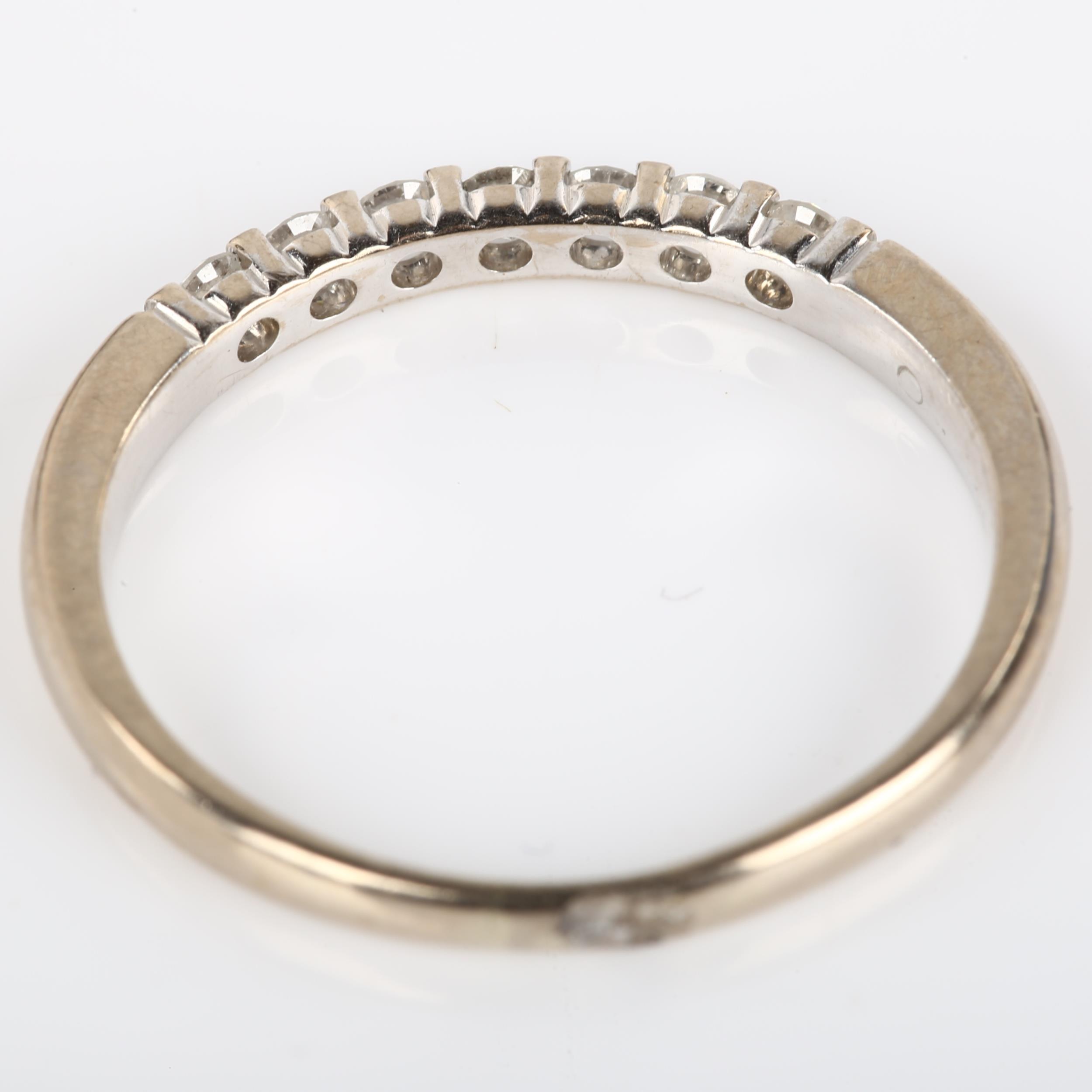 An 18ct white gold seven stone diamond ring, set with modern round brilliant-cut diamonds, total - Image 3 of 4