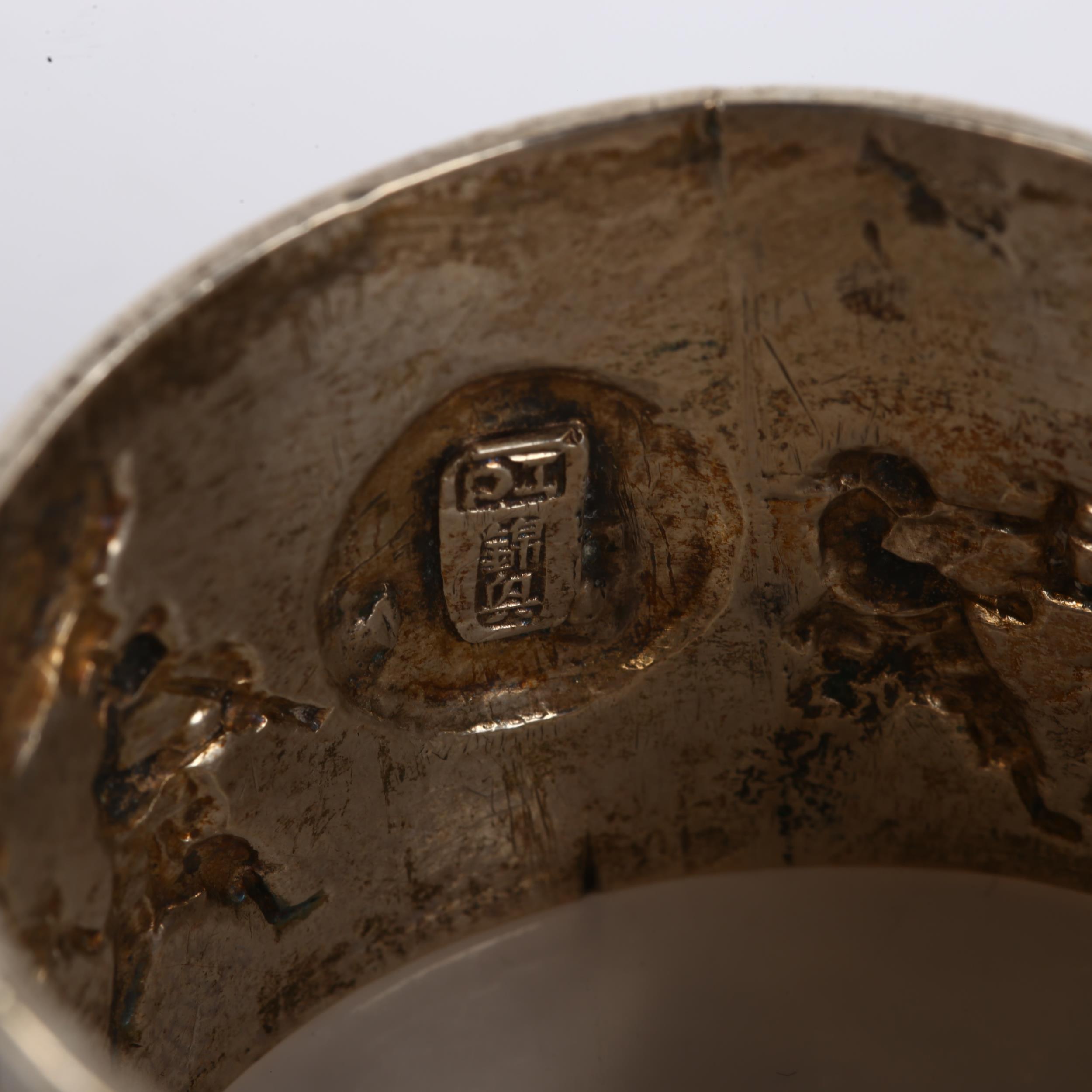 A Chinese export silver napkin ring, musical procession decoration, by Tuck Chang, circa 1900, - Image 3 of 3