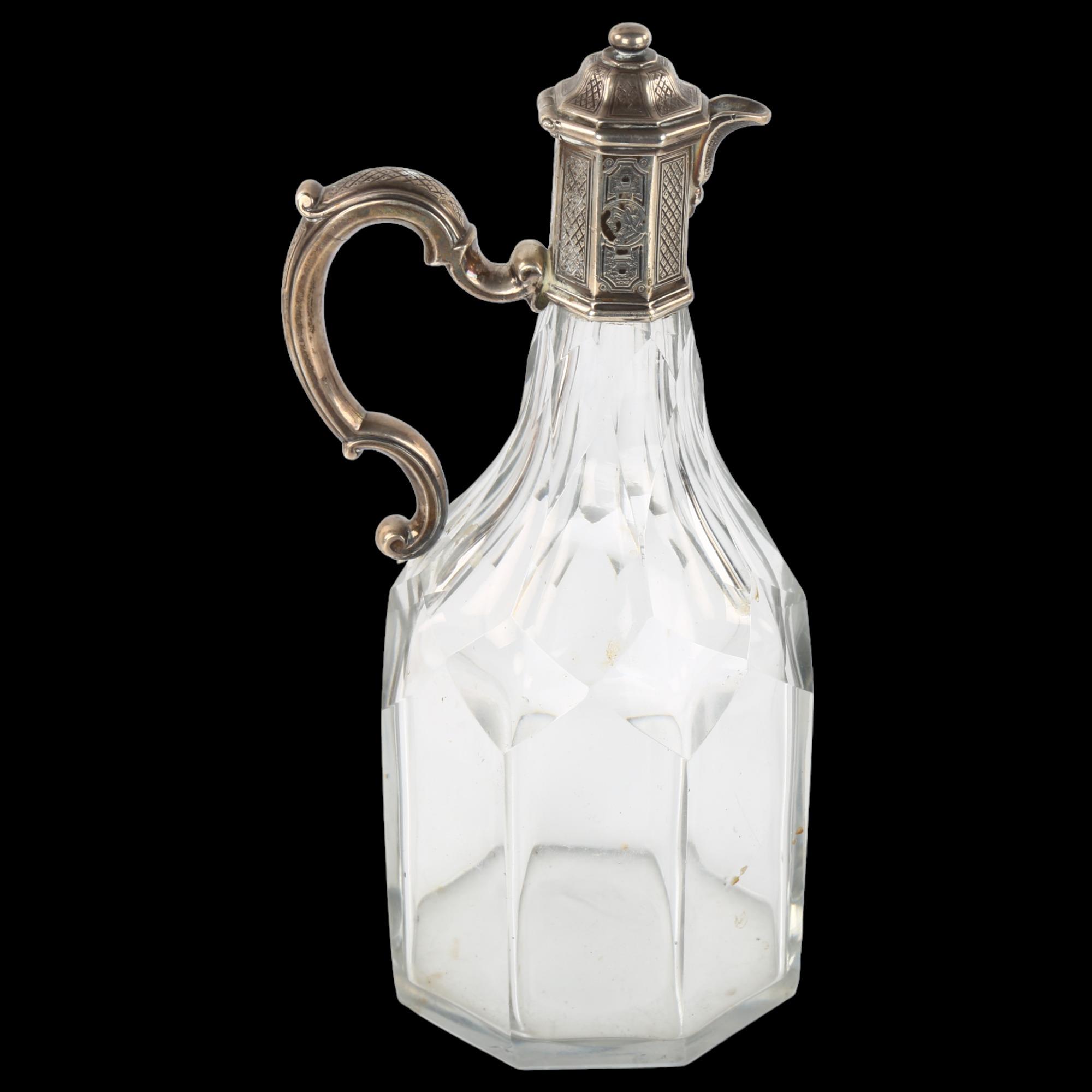 A George I/II silver-mounted cut-glass cruet bottle, in Regency style, possibly by Paul De