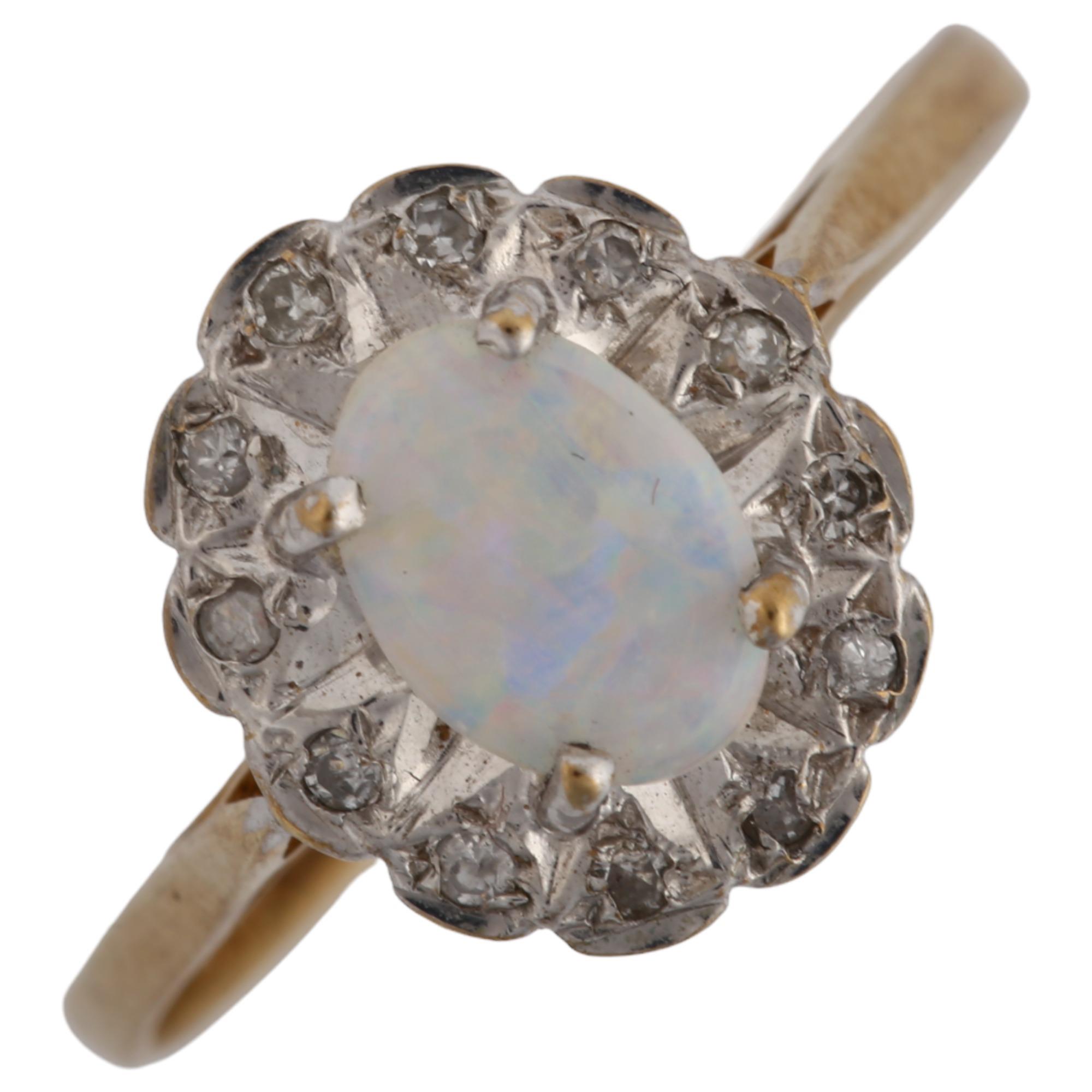 A 9ct gold opal and diamond cluster ring, set with oval cabochon opal and single-cut diamonds,